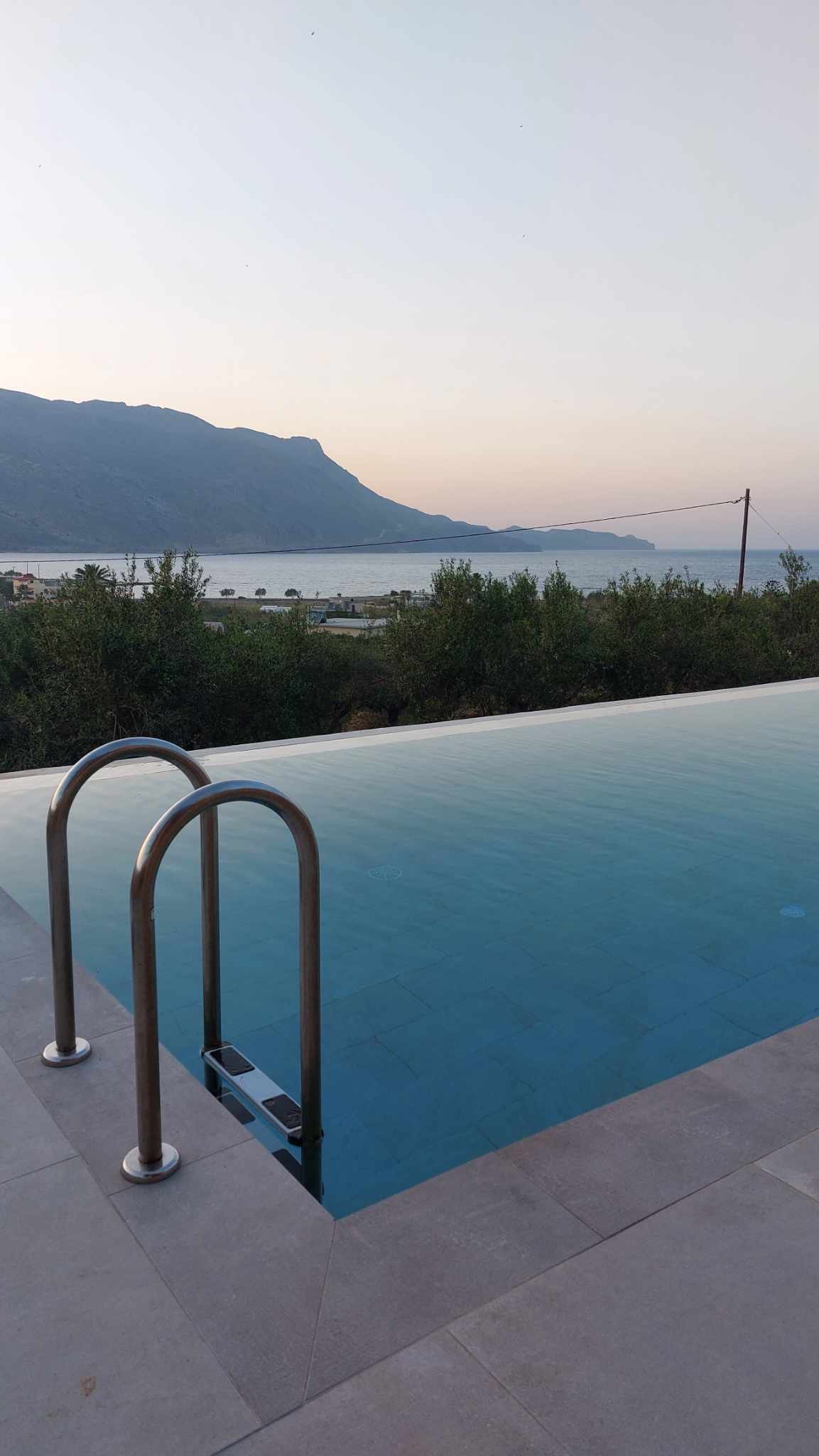 Infinity pool with bay views at Nusa Falasarna