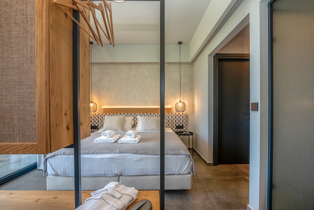 Serene bedroom with calming design at Nusa Falassarna, Crete