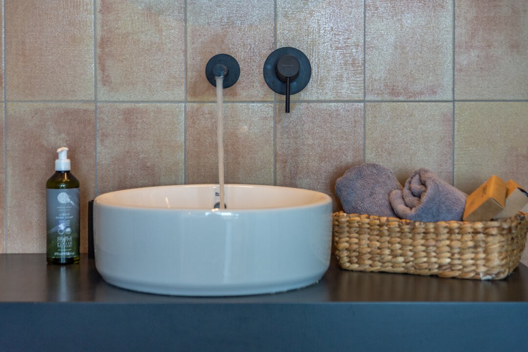 Modern bedroom with contemporary furnishings at Nusa Falassarna villa, Crete