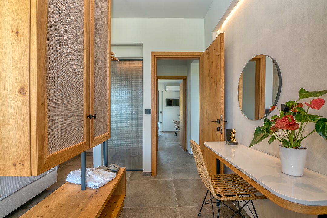 Restful bedroom with quality bedding and calming atmosphere at Nusa Falassarna villa, Crete