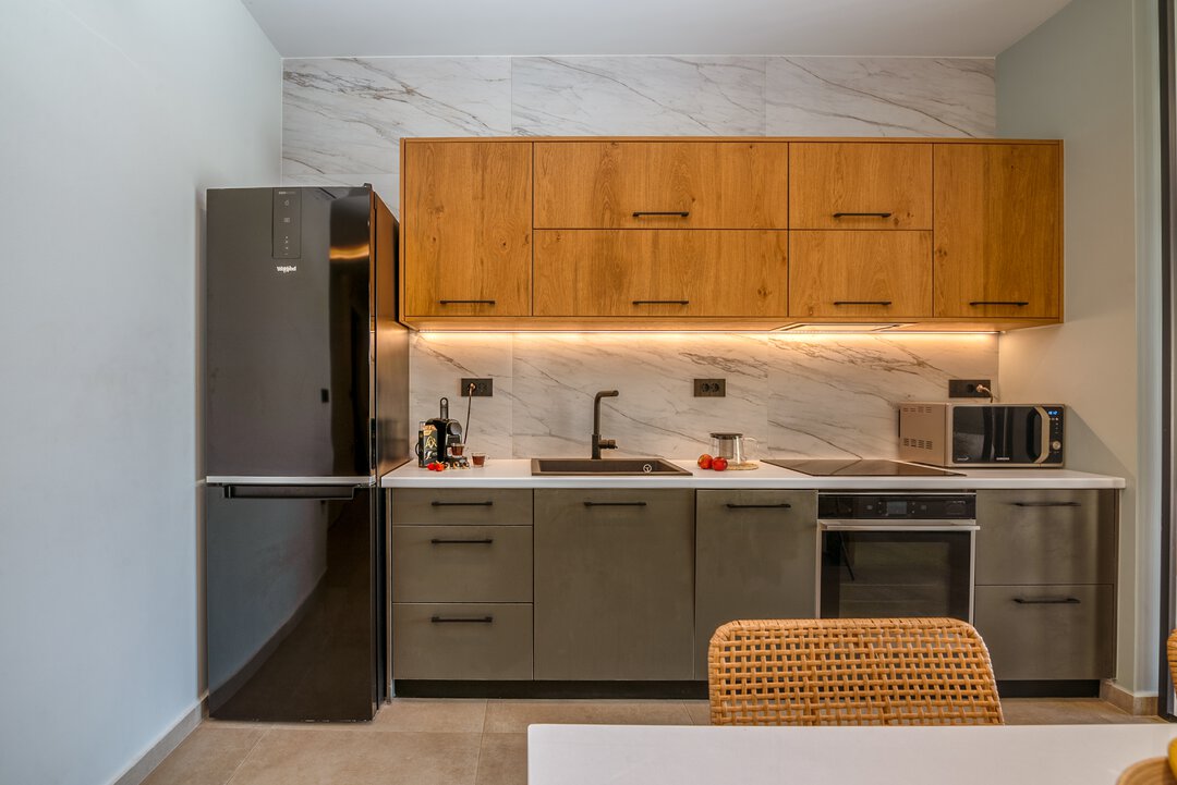 Kitchen area with built-in oven and coffee facilities at Nusa Balos villa, Crete