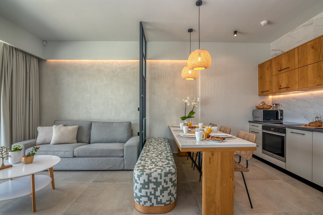 Contemporary bathroom with vessel sink and terracotta tiles at Nusa Balos villa near Balos, Crete