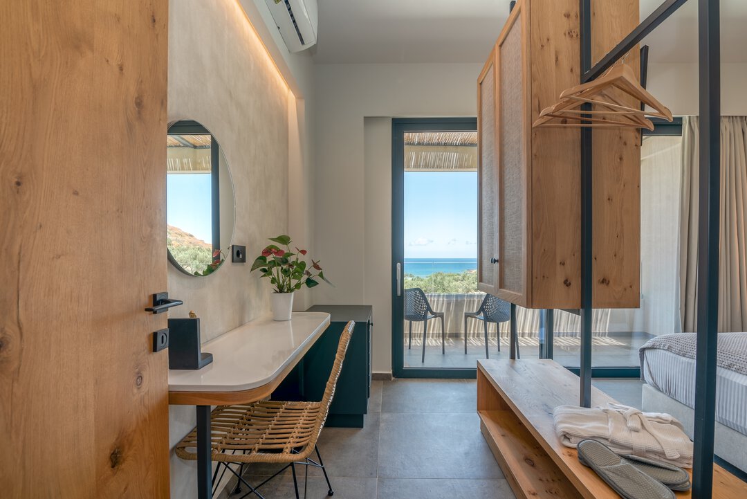 Cozy bedroom retreat with modern styling at Nusa Balos villa, Crete
