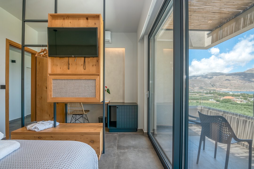 Contemporary bedroom suite with clean lines at Nusa Balos villa, Crete