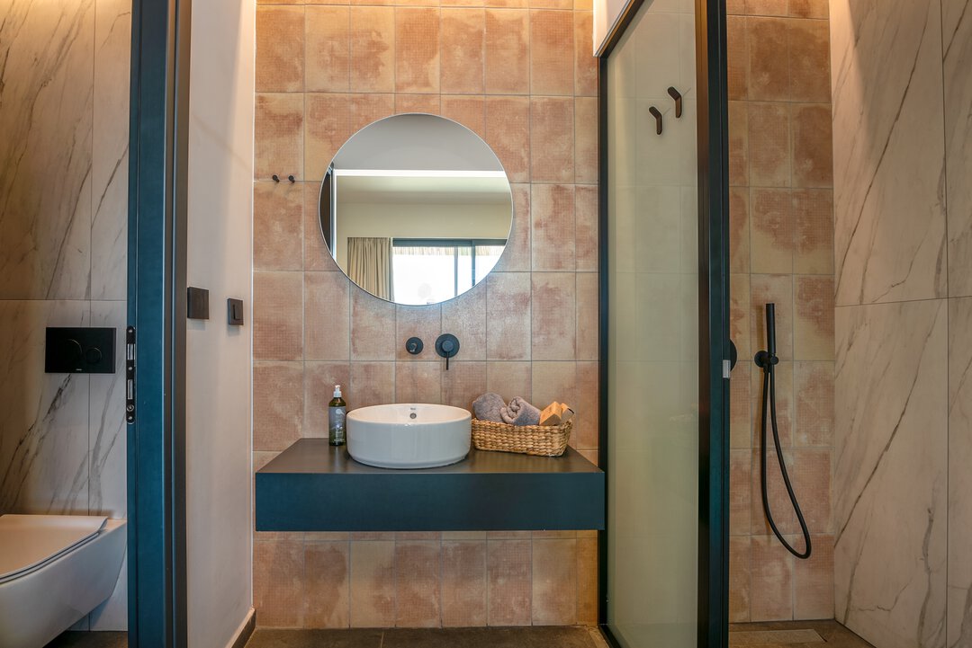 Modern bathroom with sleek fixtures at Nusa Balos villa, Crete